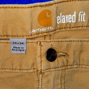 Carhartt work pants size 34x34, tan